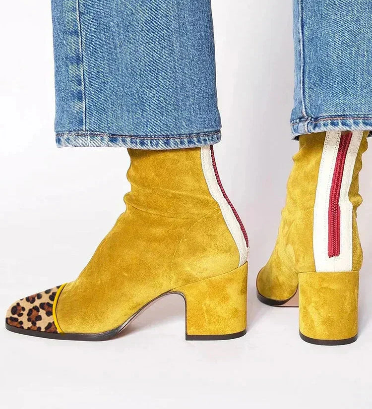 Mustard yellow suede heeled boots with leopard-print toe and block heel