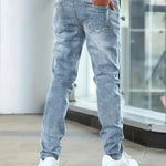 Blue casual stretch jeans, rear view with two back pockets and straight-leg cut