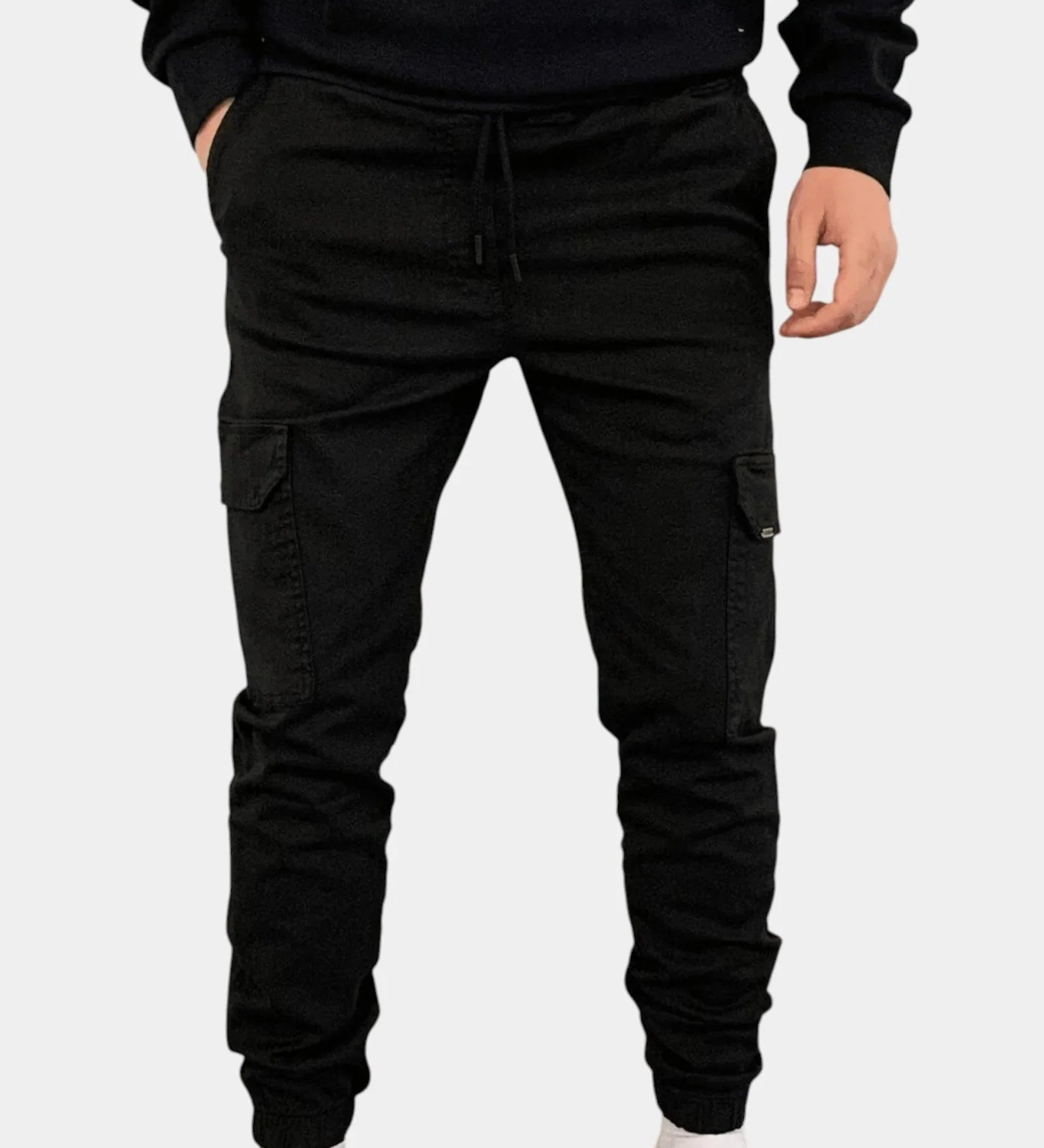 Black cargo jogger pants with drawstring waist, side cargo pockets, elastic cuffs.