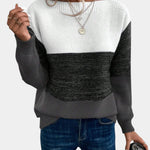 Two-tone knit pullover with crew neck, cream upper to charcoal gray gradient