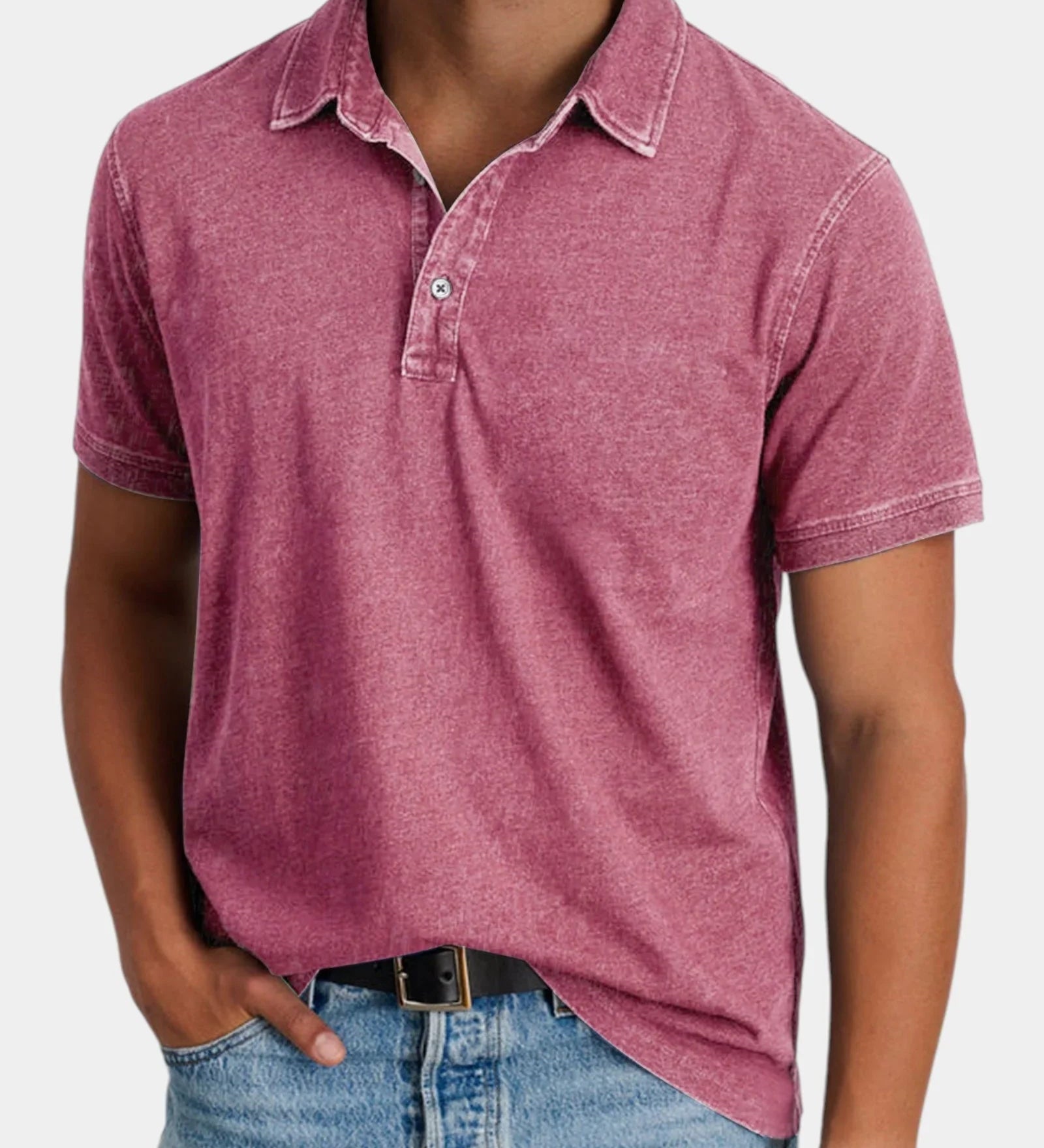 Pink classic polo shirt with short sleeves, button placket, and collared neckline