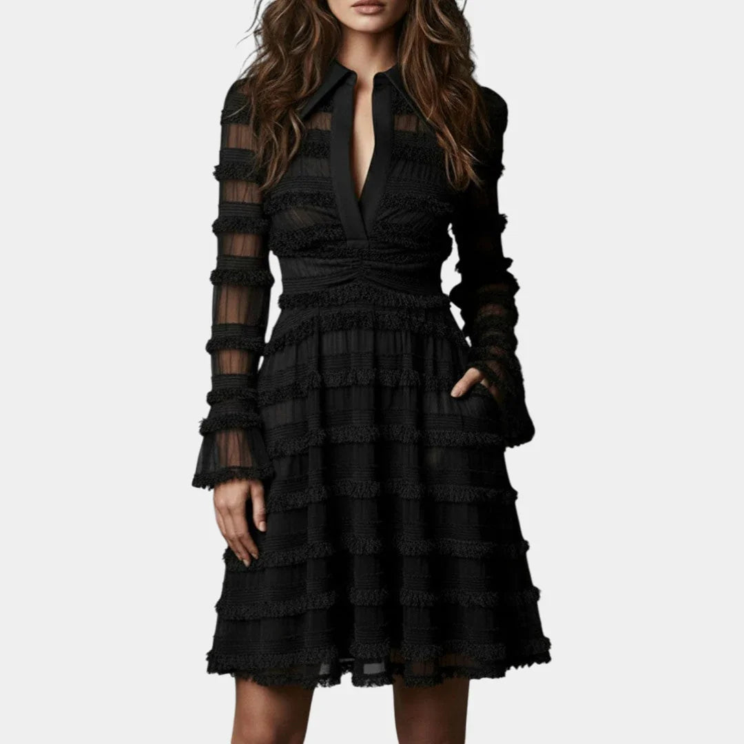 Black tiered ruffle dress with V-neck and sheer long sleeves