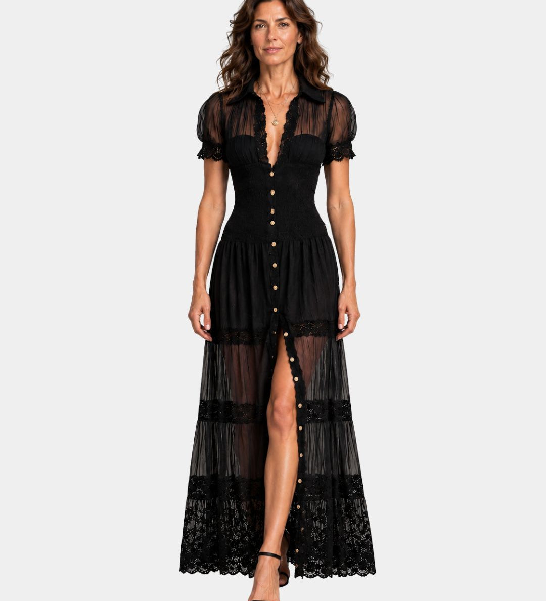 Black long dress with puff sleeves, button front, and tiered lace hem