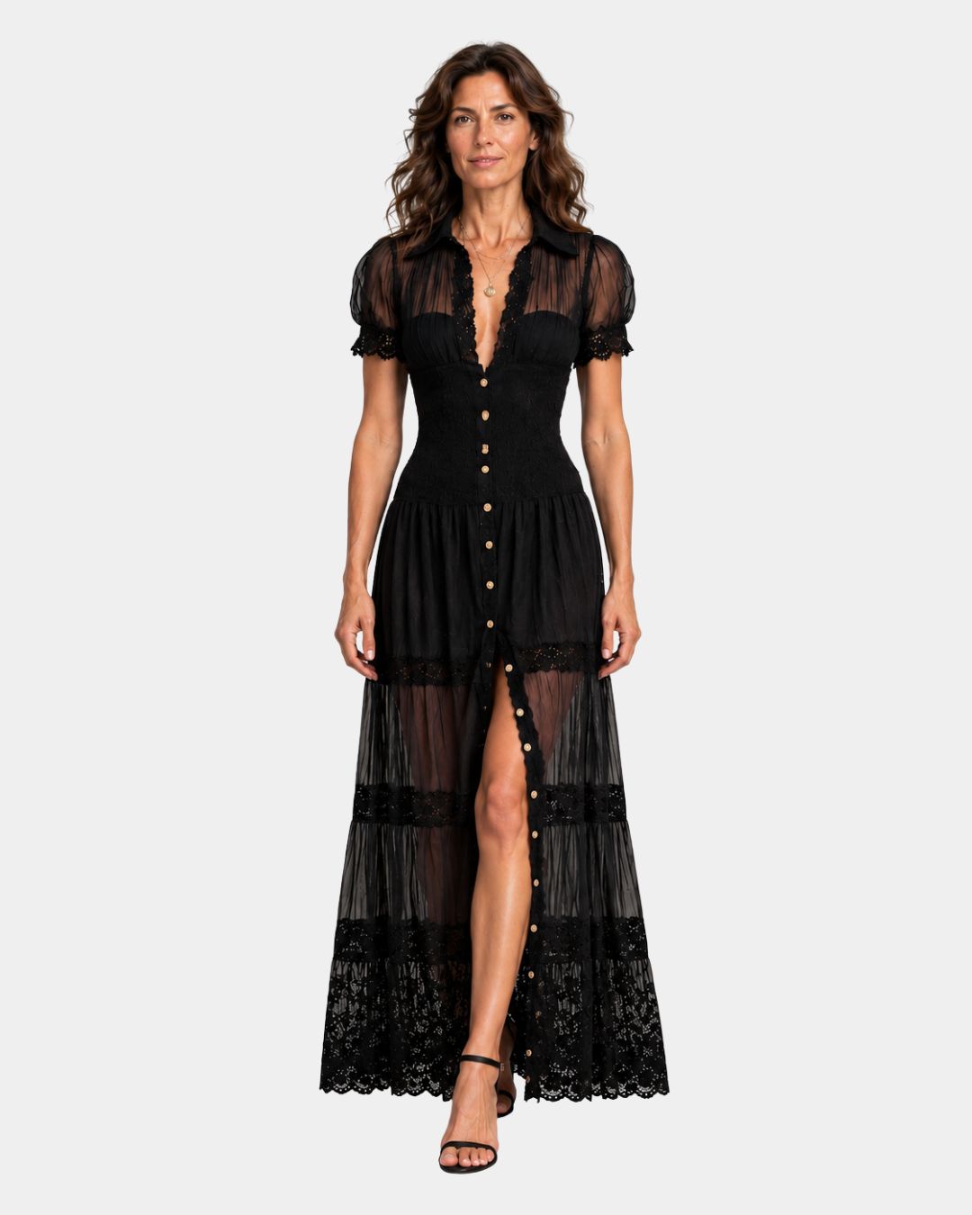Black long dress with puff sleeves, button front, and tiered lace hem