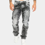 Gray stretch jeans with a tapered leg, five-pocket styling, and cuffed hem
