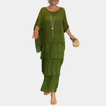 Olive green tiered maxi dress with loose fit, three-quarter sleeves, and tiered skirt