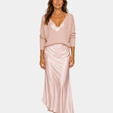 Pink V-neck dress with blouse top and satin midi skirt