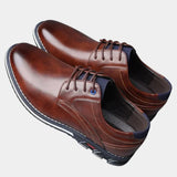 Brown lace-up leather-style shoes with padded collar and striped rubber sole