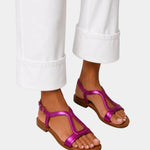 Magenta T-strap open-toe sandals with low block heel and ankle strap