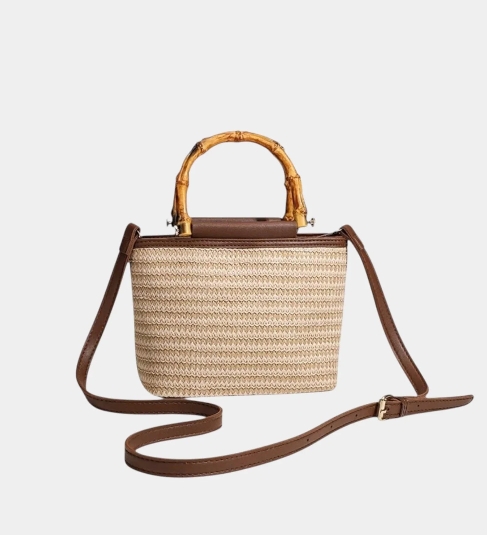Beige knitted style bag with bamboo top handles and brown crossbody strap
