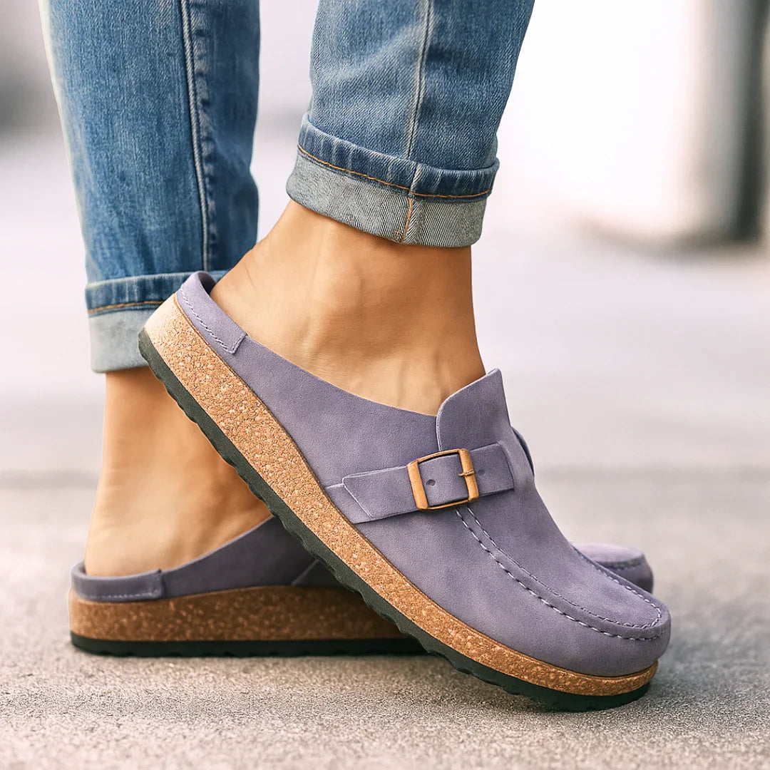 Purple orthopedic slip-on loafers with buckle strap and speckled sole