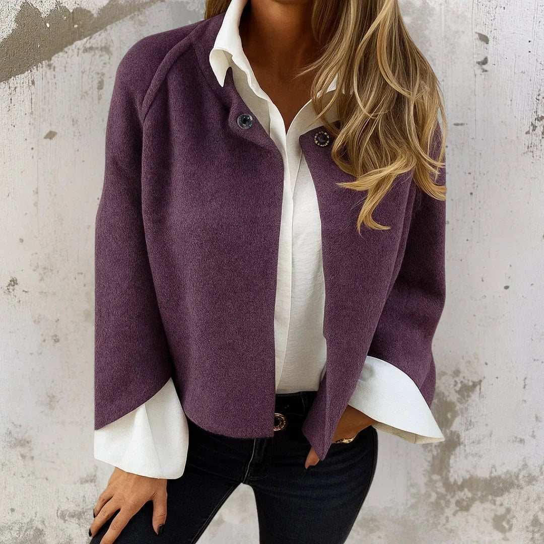 Purple short jacket with snap button front and rounded collar, long sleeves