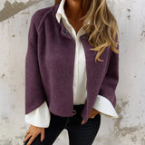 Purple short jacket with snap button front and rounded collar, long sleeves