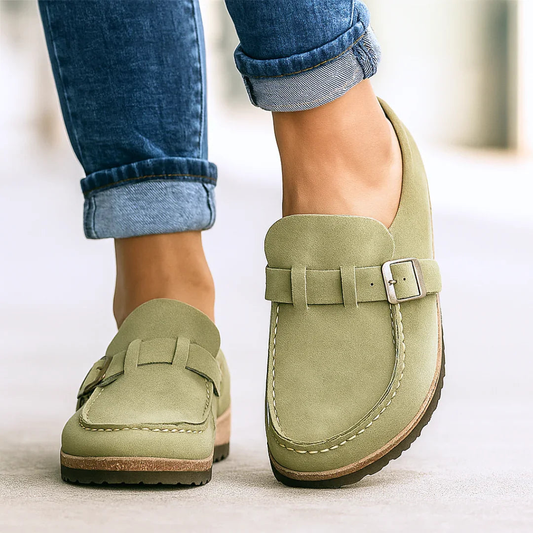 Olive green orthopedic slip-on loafers with buckle strap and stitched edges
