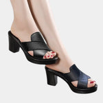 Orthopedic slide sandal with open toe, two straps, black leather and black block heel