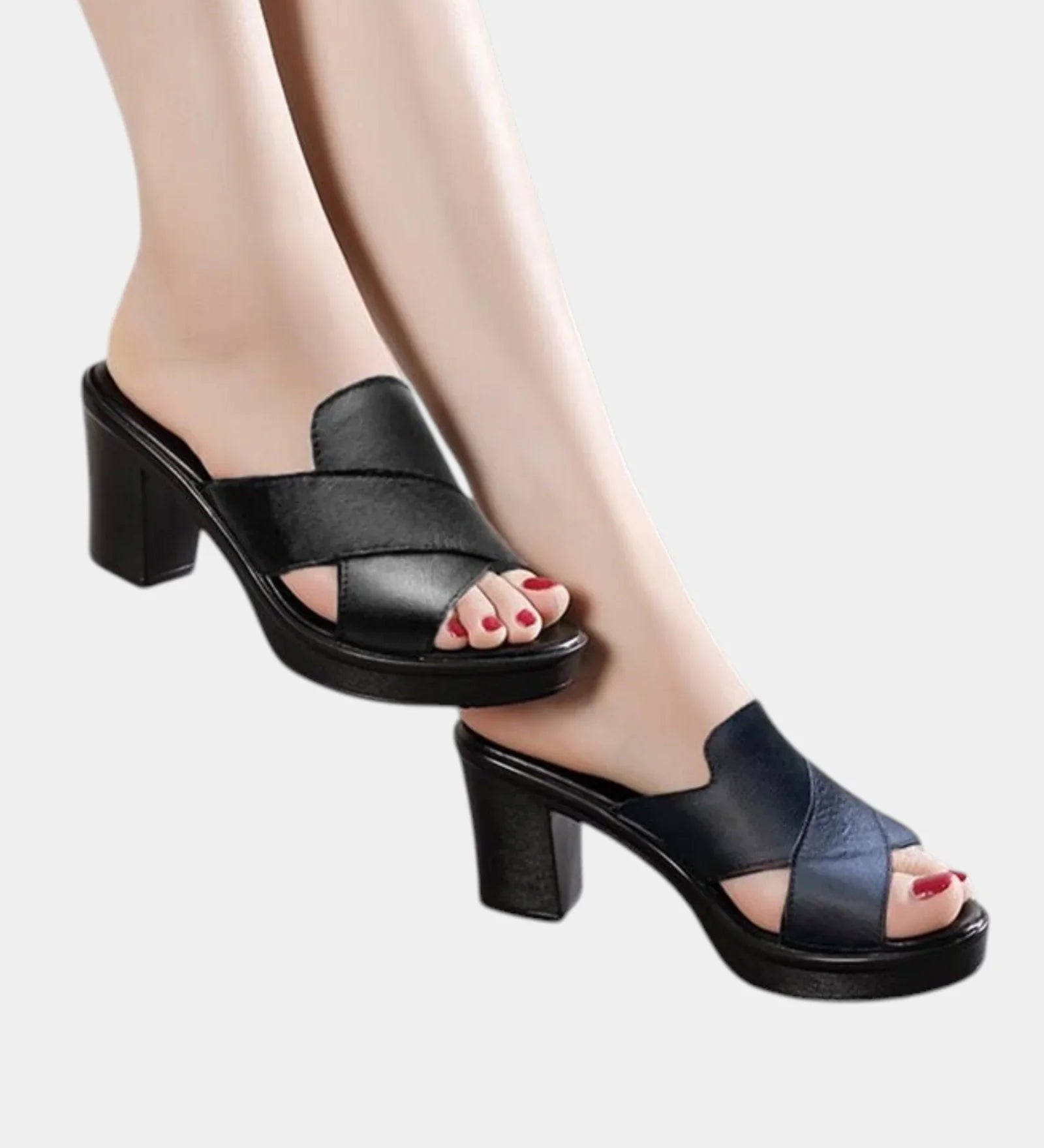 Black orthopedic slide sandals with wide cross straps and chunky block heel