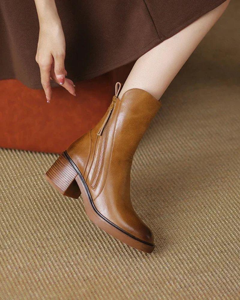 Brown leather ankle boots, pointed toe, side zip, and tassel pull tab