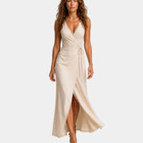 Beige midi dress with cross V neckline, fitted waist and side slit