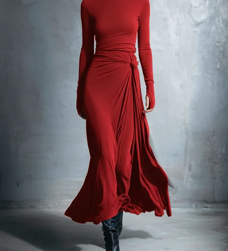 Burgundy long-sleeve draped maxi dress with ruched waist and side-tied skirt