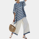 Ornela | Sophisticated blue striped top and pants with details at the bottom