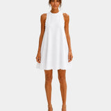 White minimalist short dress, sleeveless high neck with scalloped hem and trim