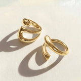 Gold ring set with two stacked open oval bands, adjustable fit