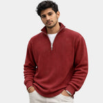 Red ribbed quarter-zip sweater with long sleeves and metal zip placket