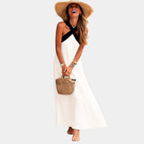 Maxi dress with crossed halter straps, sleeveless white flared skirt