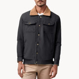Mens black bomber jacket with tan sherpa collar, button-up front and chest pockets