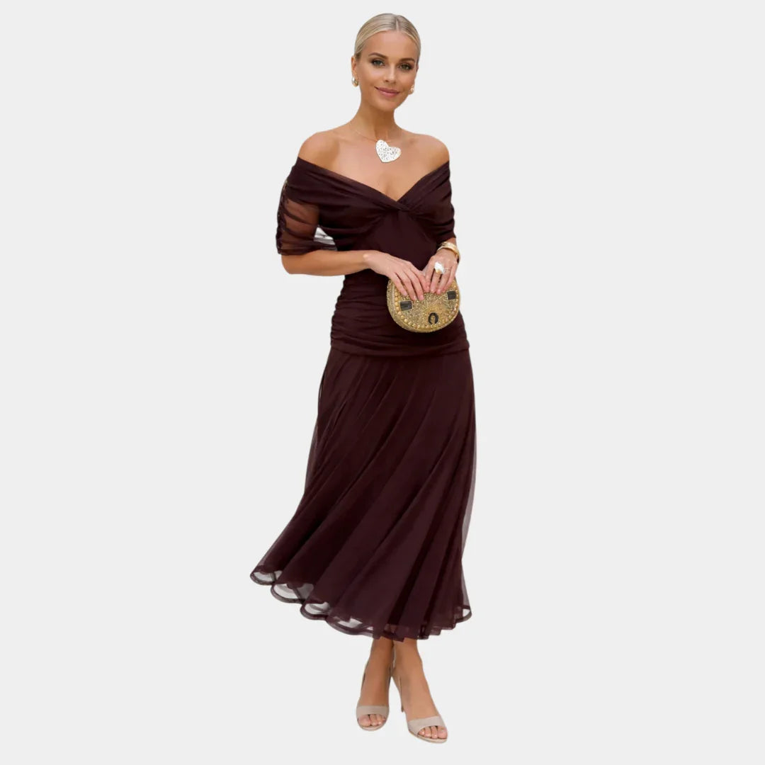 Long dark burgundy dress with draped V-neck and flowing chiffon skirt
