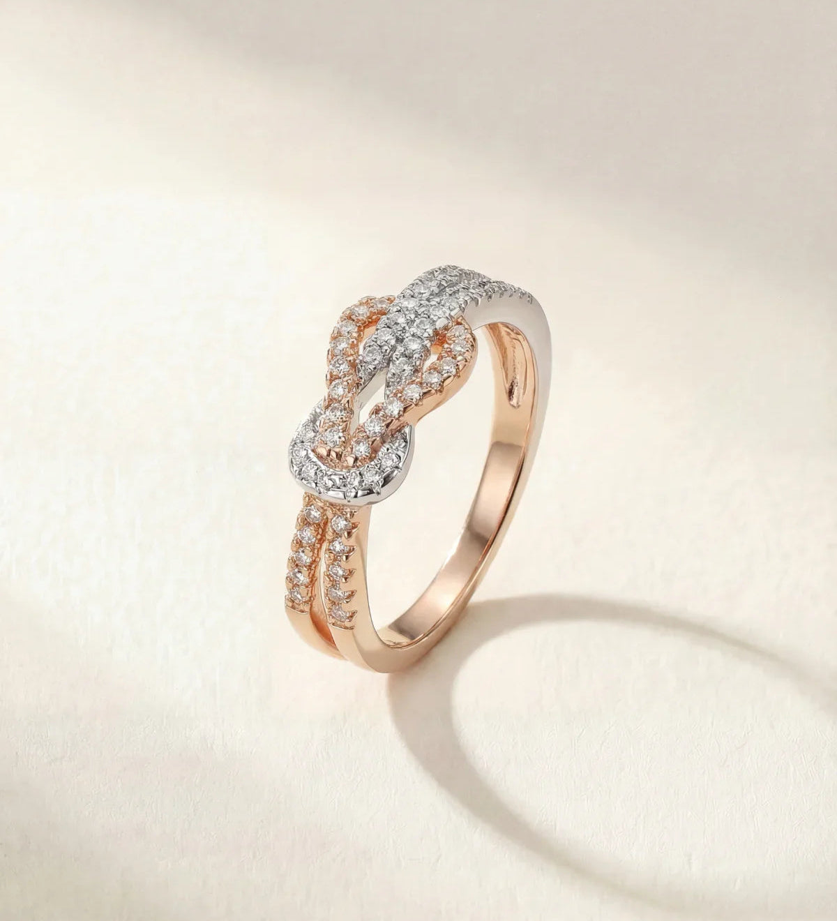 Albane infinity ring in gold and silver with pavé-set crystal links