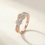 Albane infinity ring in gold and silver with pavé-set crystal links