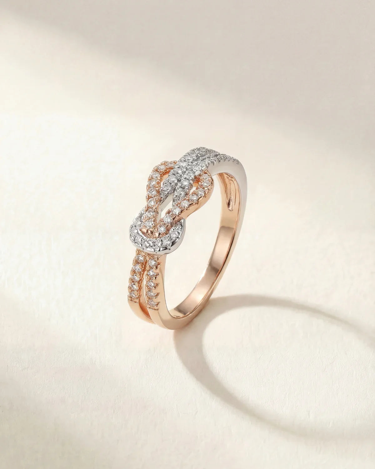 Albane infinity ring in gold and silver with pavé-set crystal links