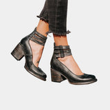 Black ankle-strap block heel shoes with buckle, chunky mid heel, pointed toe