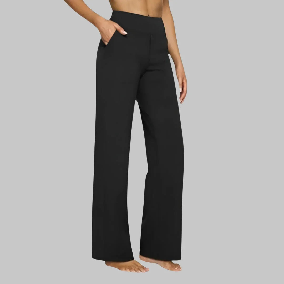 Black wide-leg trousers with high-rise waist and side pockets, clean straight silhouette.