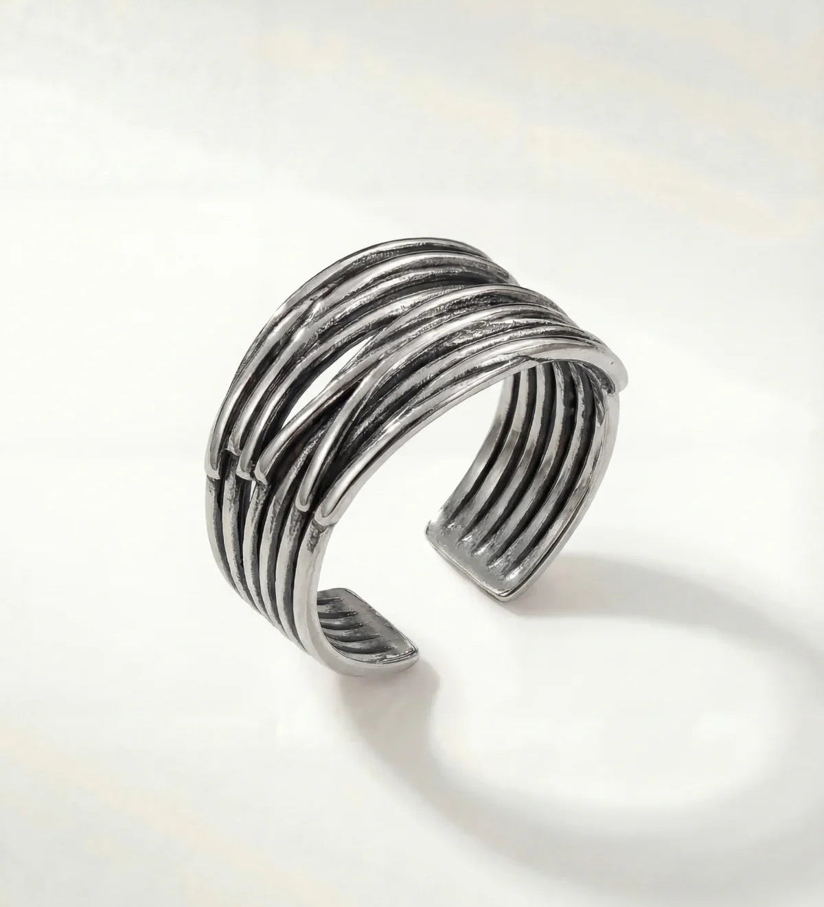 Silver modern ridged stack ring with open adjustable band