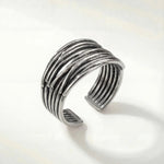 Silver modern ridged stack ring with open adjustable band