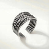 Silver modern ridged stack ring with open adjustable band