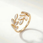 Gold leaf motif adjustable ring with openwork design