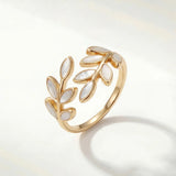 Gold leaf motif adjustable ring with openwork design