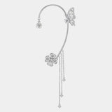 Silver magical ear cuff with butterfly and flower charms, dangling chain tassel