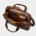 Caramel leather briefcase open interior with organizers and zipper pocket.