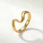 Gold wavy ring with a smooth polished band