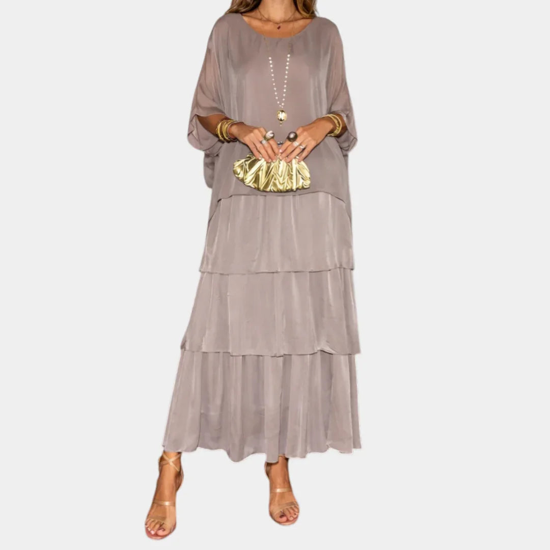 Taupe tiered maxi dress with sheer billowy sleeves and layered ruffle skirt