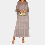 Taupe tiered maxi dress with sheer billowy sleeves and layered ruffle skirt
