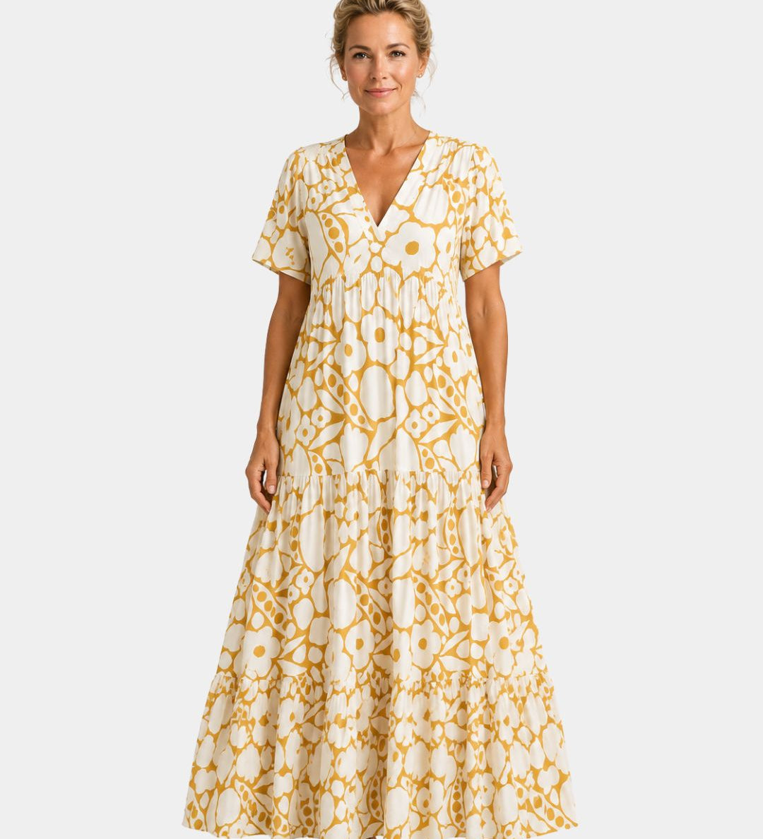 Yellow floral maxi dress with V-neck, short sleeves, and tiered maxi skirt