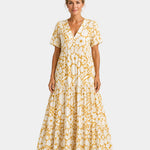 Yellow floral maxi dress with V-neck, short sleeves, and tiered maxi skirt