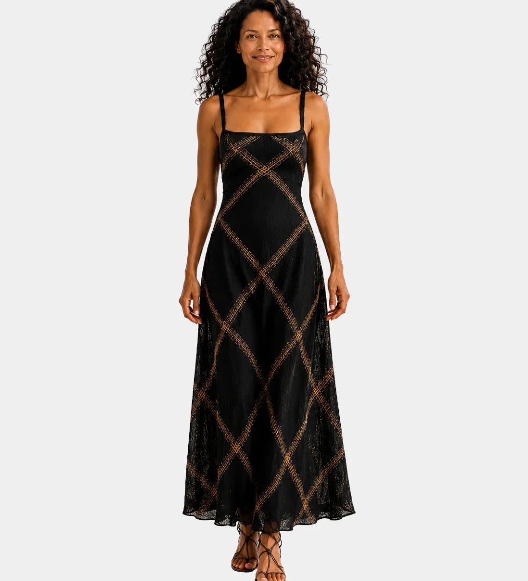 Black long maxi dress with spaghetti straps and gold diamond pattern
