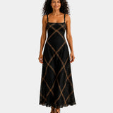 Black long maxi dress with spaghetti straps and gold diamond pattern