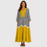 Mustard yellow V-neck summer dress with black-and-white chevron sleeves